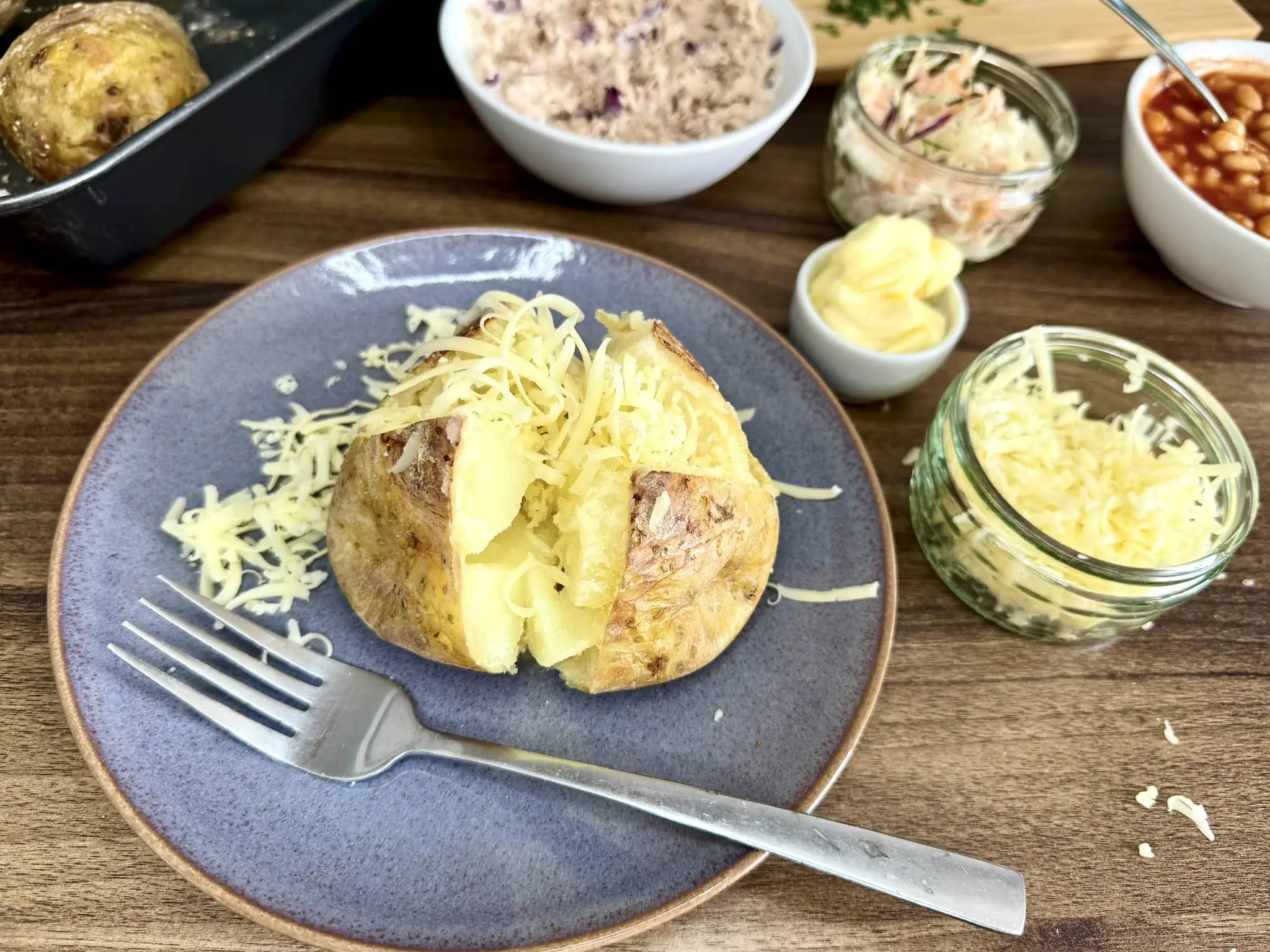Cheese added to the baked potato