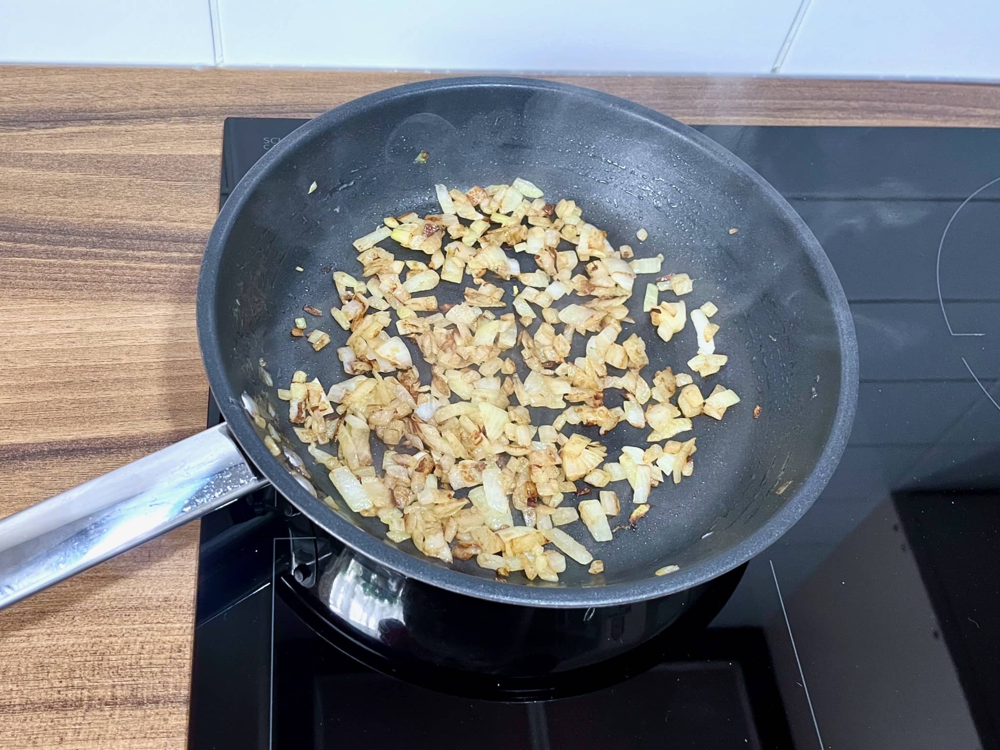 Fried onion in a pan