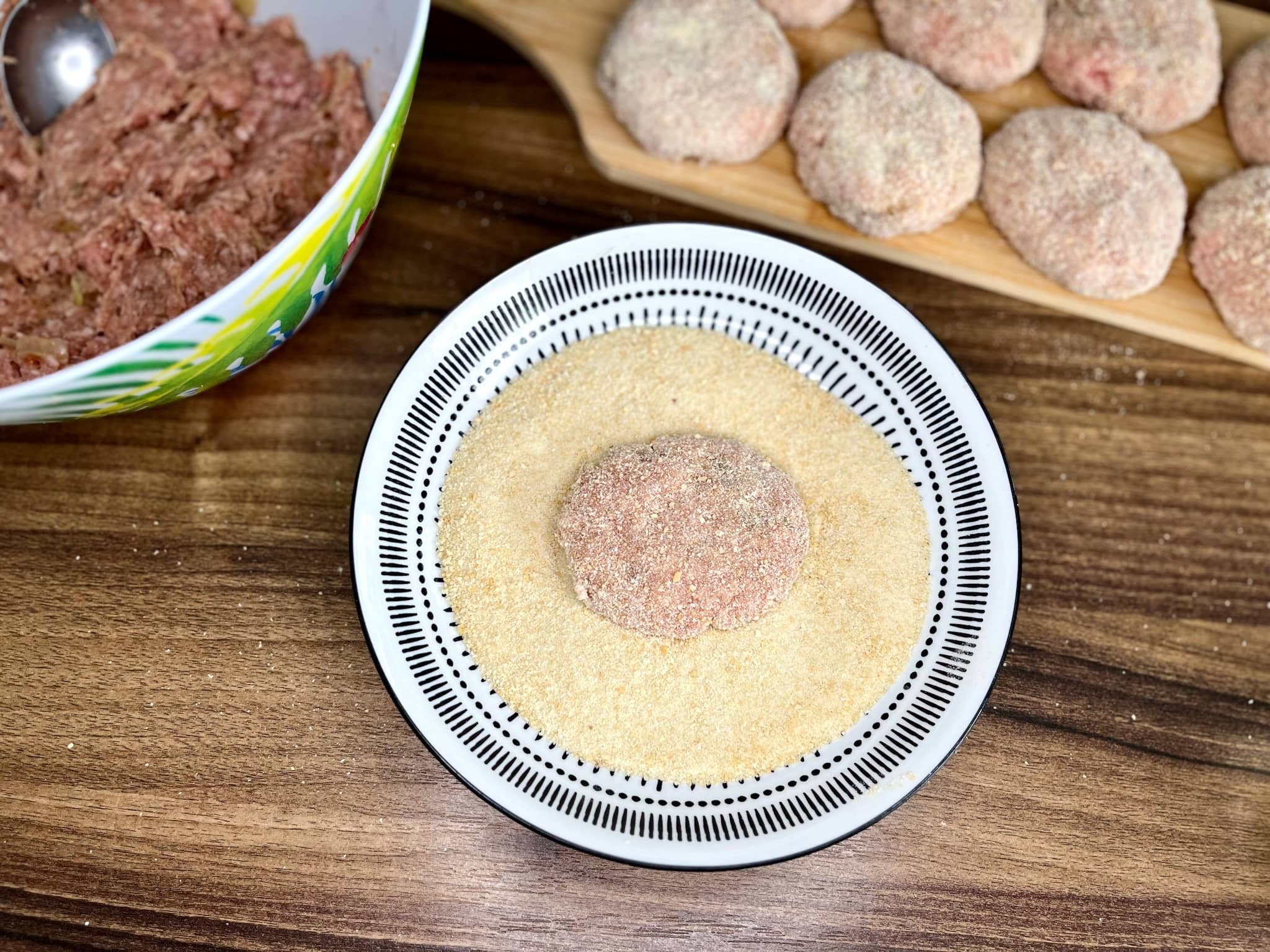 Nicely coated portion of meat mixture in a breadcrumbs