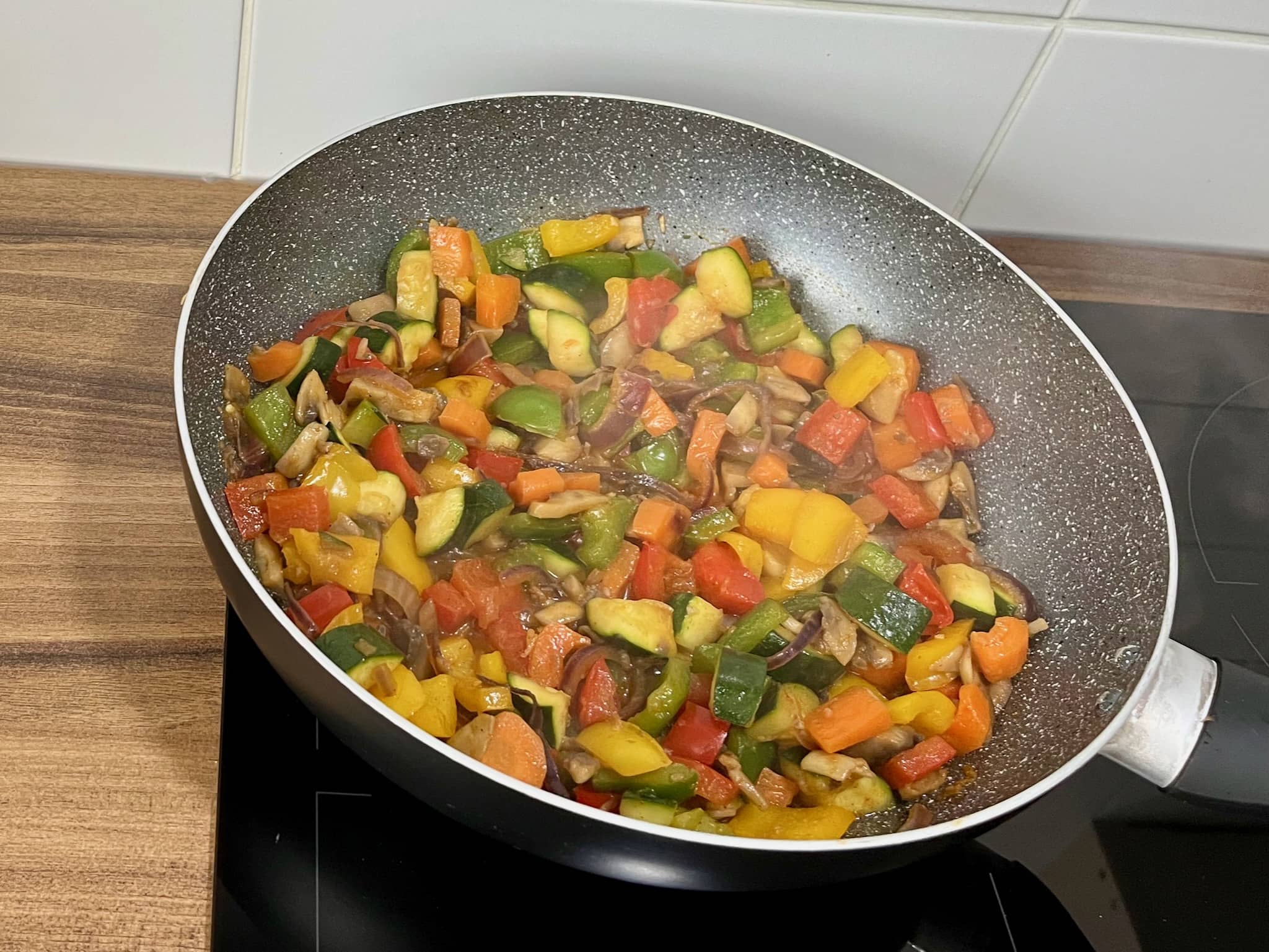 Vegetables frying in a pan