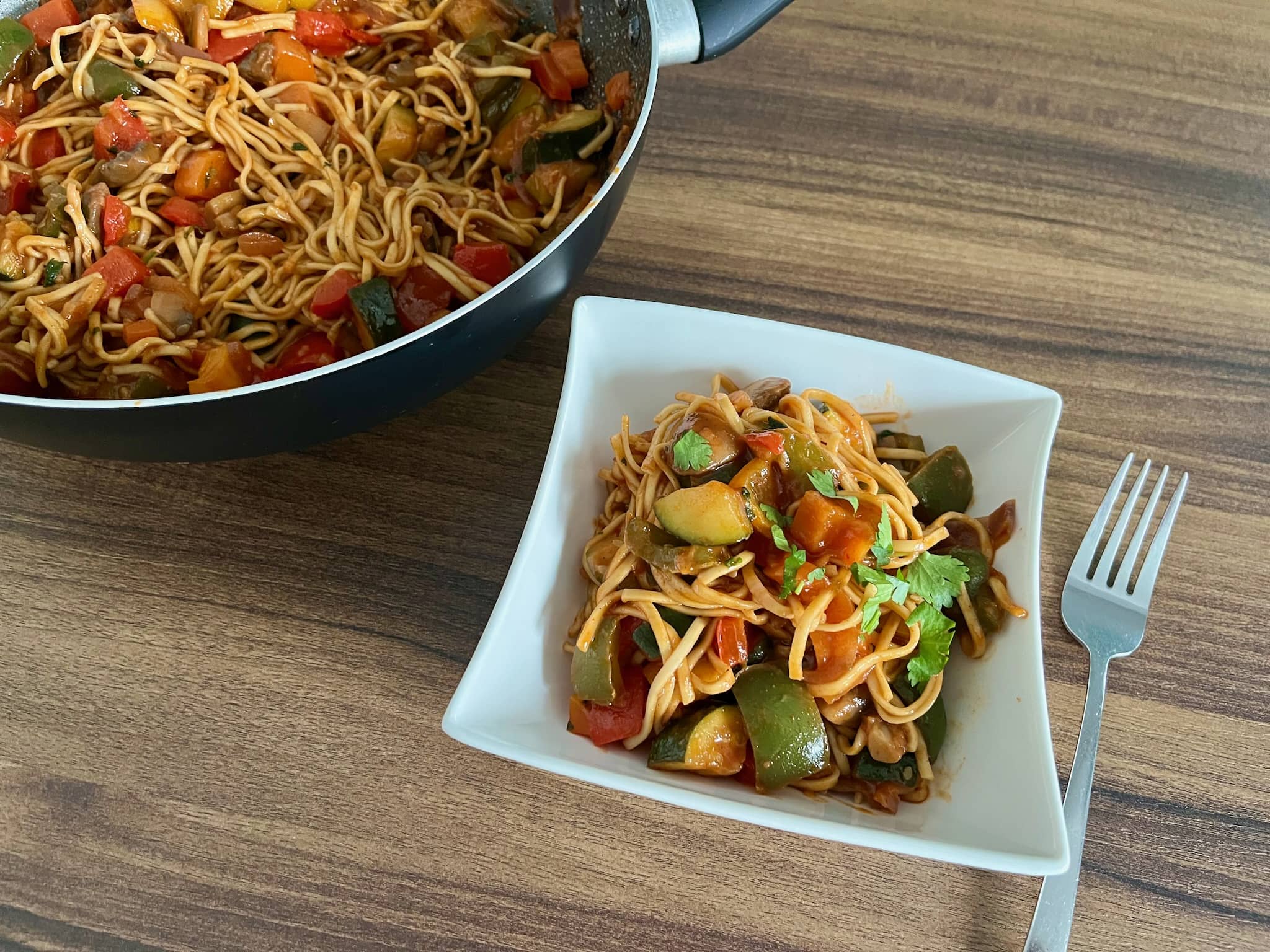A portion of Vegetable Stew with Noodles in a bowl