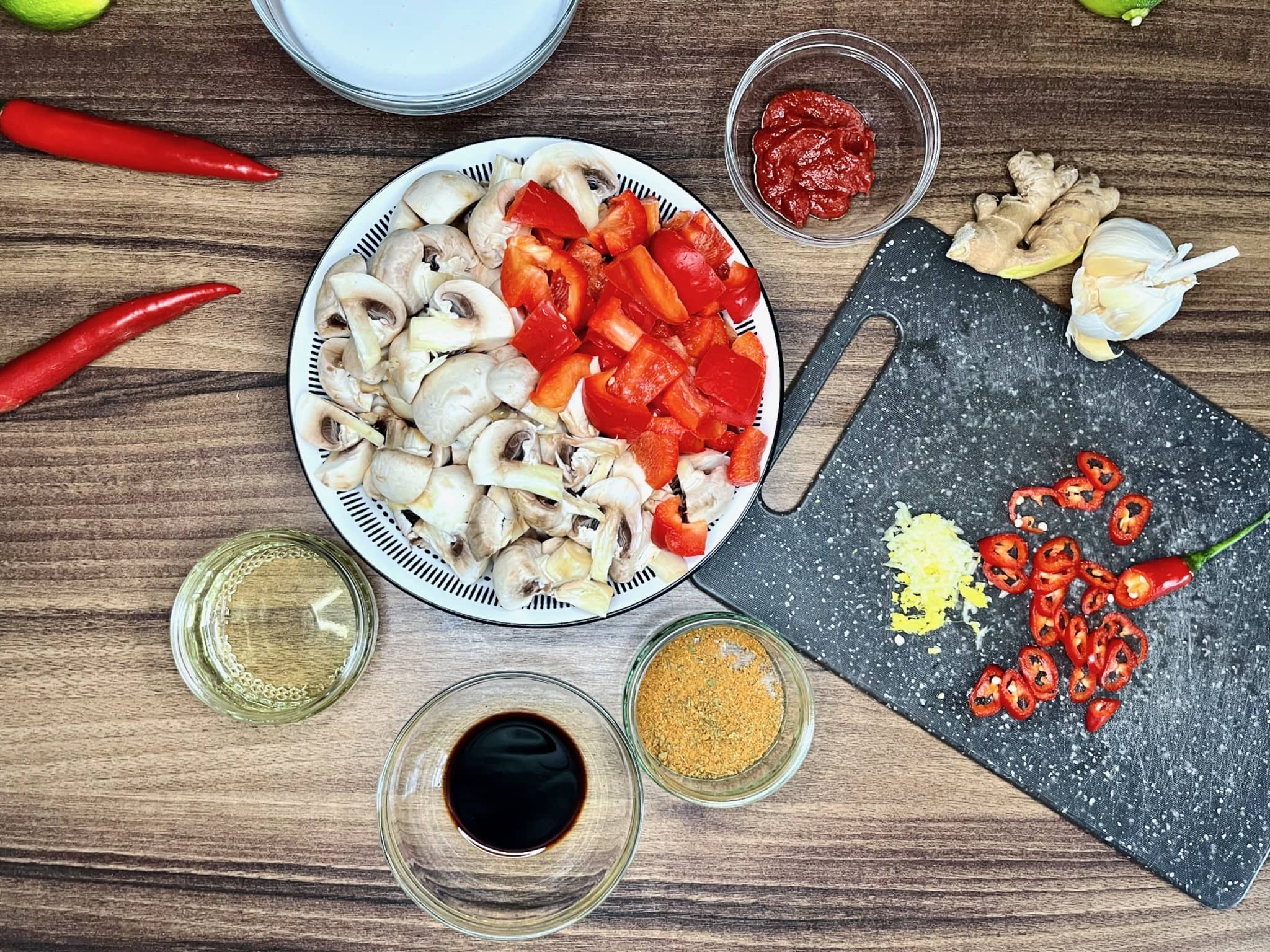 The carefully prepared ingredients are arranged on the table, ready to make Veggie Thai Curry with Udon Noodles