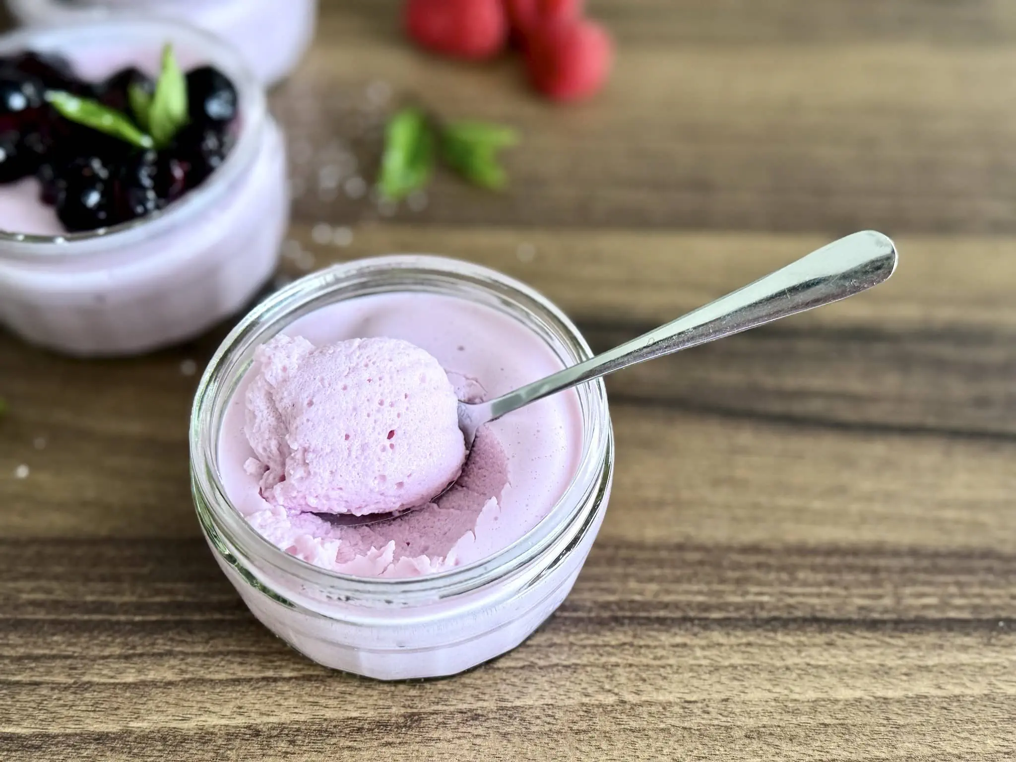 Plain Yoghurt Mousse Pudding with a spoon inside
